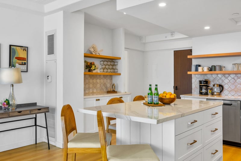 Fully equipped kitchen blending modern design with island comfort.