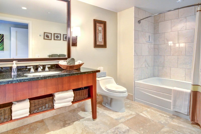 Modern guest bath with dual vanity, full tub-shower combo, and spa-inspired finishes in a clean, airy layout   