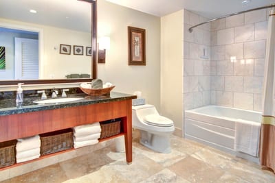 Modern guest bath with dual vanity, full tub-shower combo, and spa-inspired finishes in a clean, airy layout