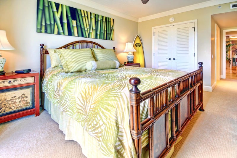 Spacious second bedroom with garden motifs and full closet, perfect for families or friends sharing paradise
