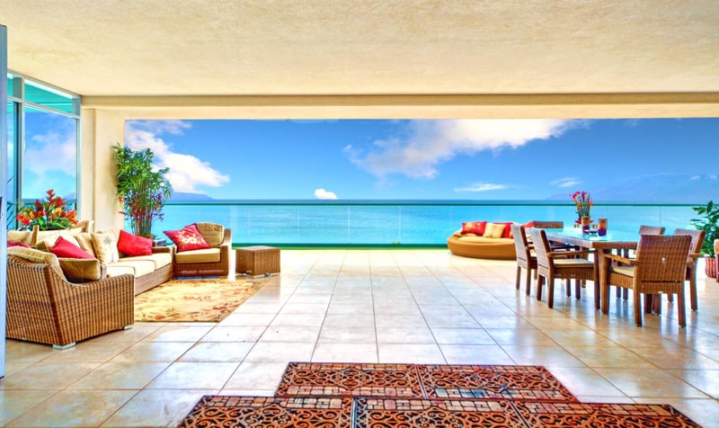 Oceanfront terrace with panoramic views, ideal for luxury dining, lounging, and unforgettable sunsets daily