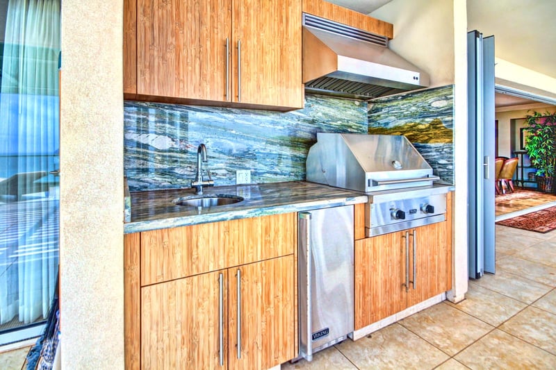 Grill your favorites just steps from the view in this private outdoor BBQ nook

