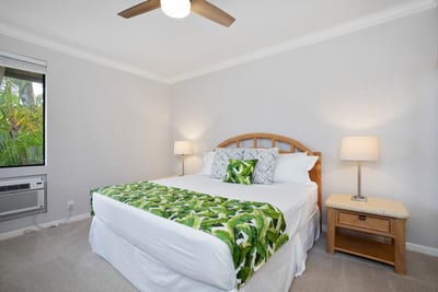 Sleep beneath a ceiling fan that swirls daydreams while the jungle-green bedspread sings a leafy lullaby GCH-120
