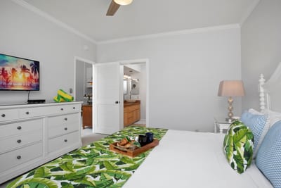 Catch island dreams surrounded by white coastal charm, cheeky greens, and a flat-screen for your sunset wind-down GCH-120