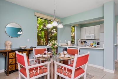 Chic dining area with bold island colors and seating for four