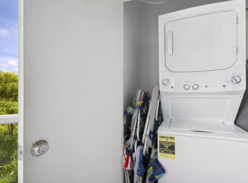 A stacked washer/dryer for added convenience during your stay