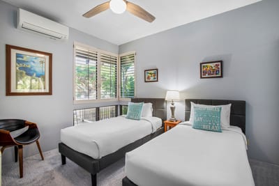 Ideal for kids or extra guests, this room offers two twin beds in a cheerful setting