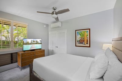 Classic tones meet contemporary charm in this inviting bedroom escape.