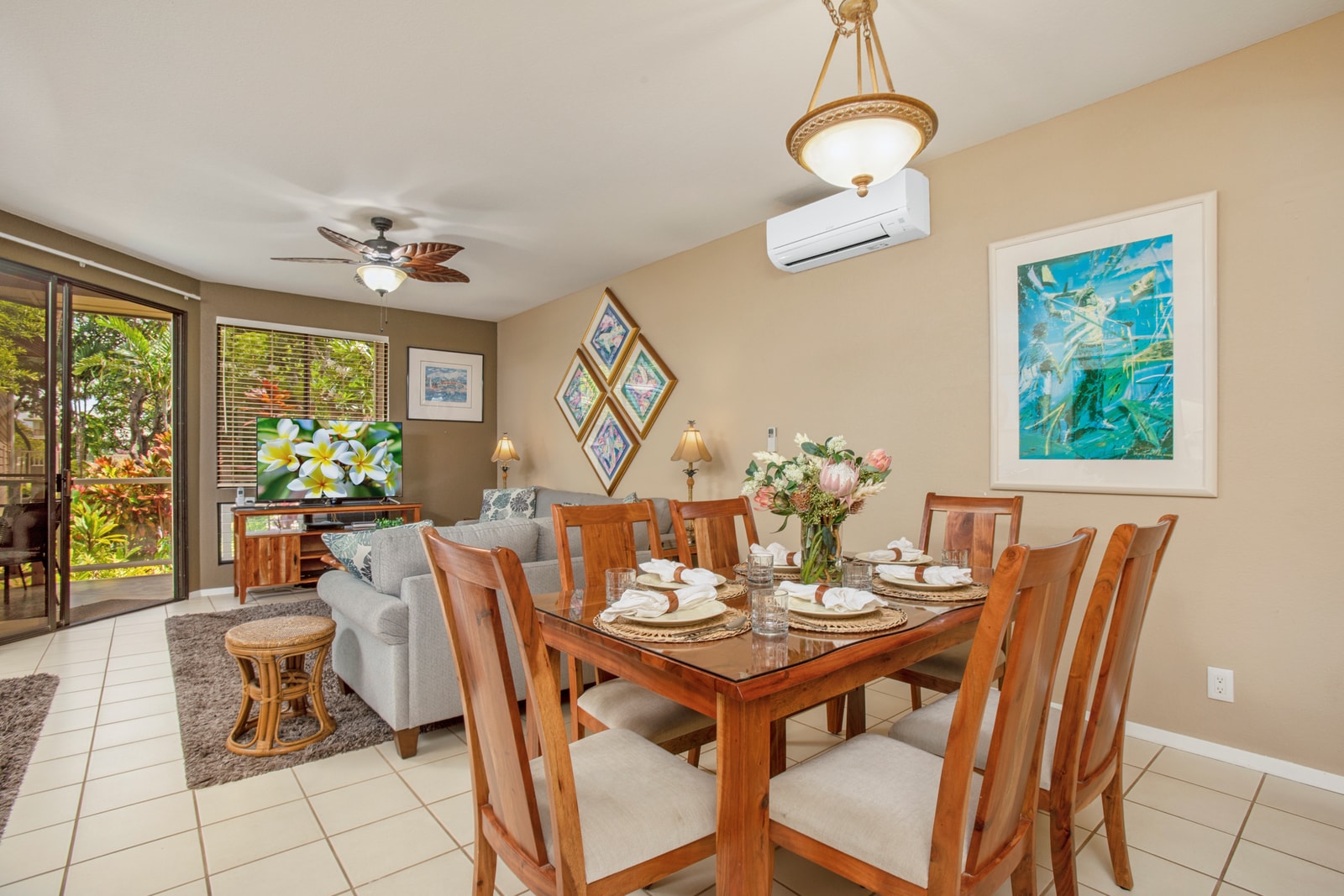 Warm dining area with seating for six and garden views