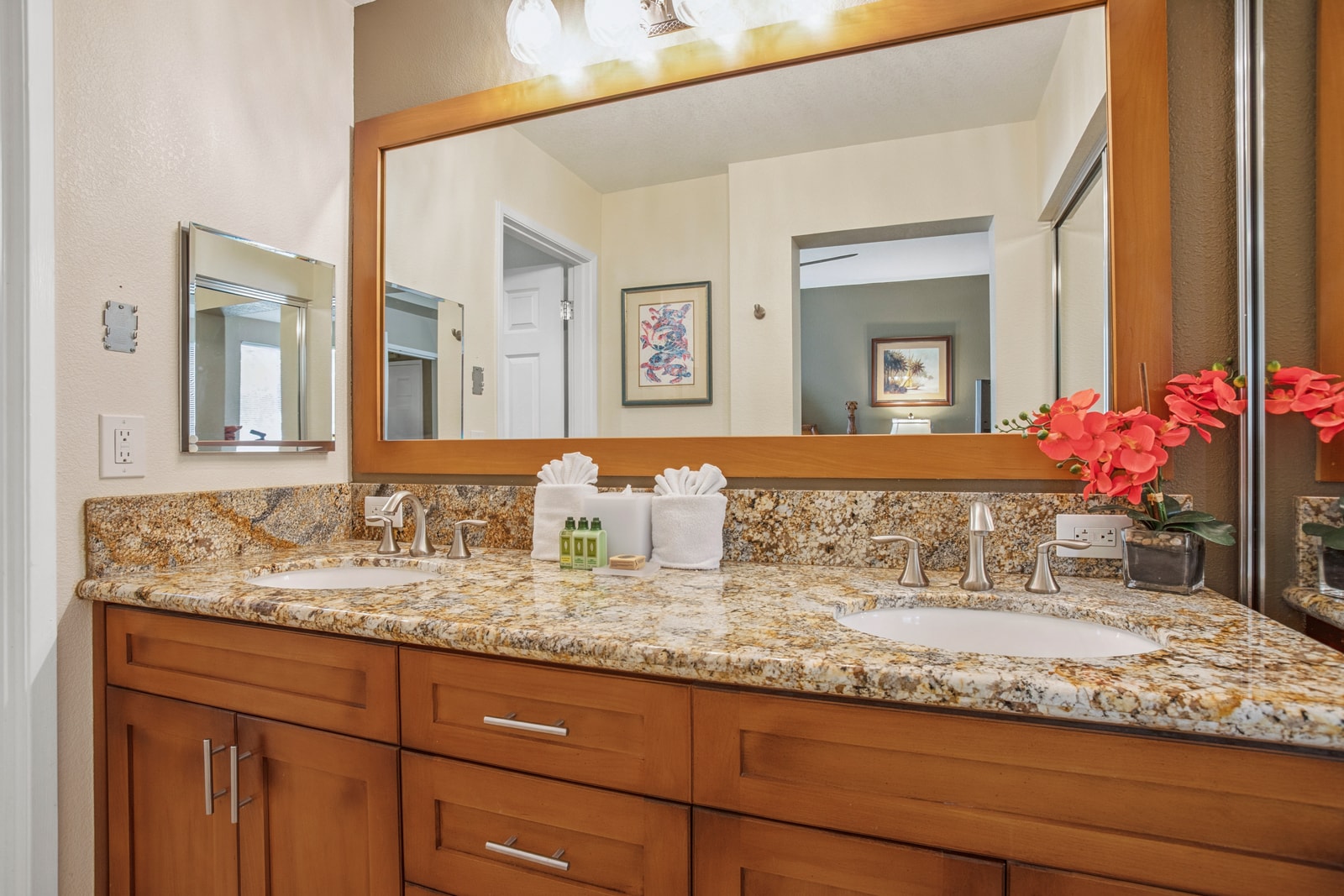 Spa-style master bath with polished wood and natural tones