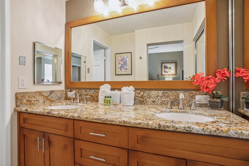 Spa-style master bath with polished wood and natural tones