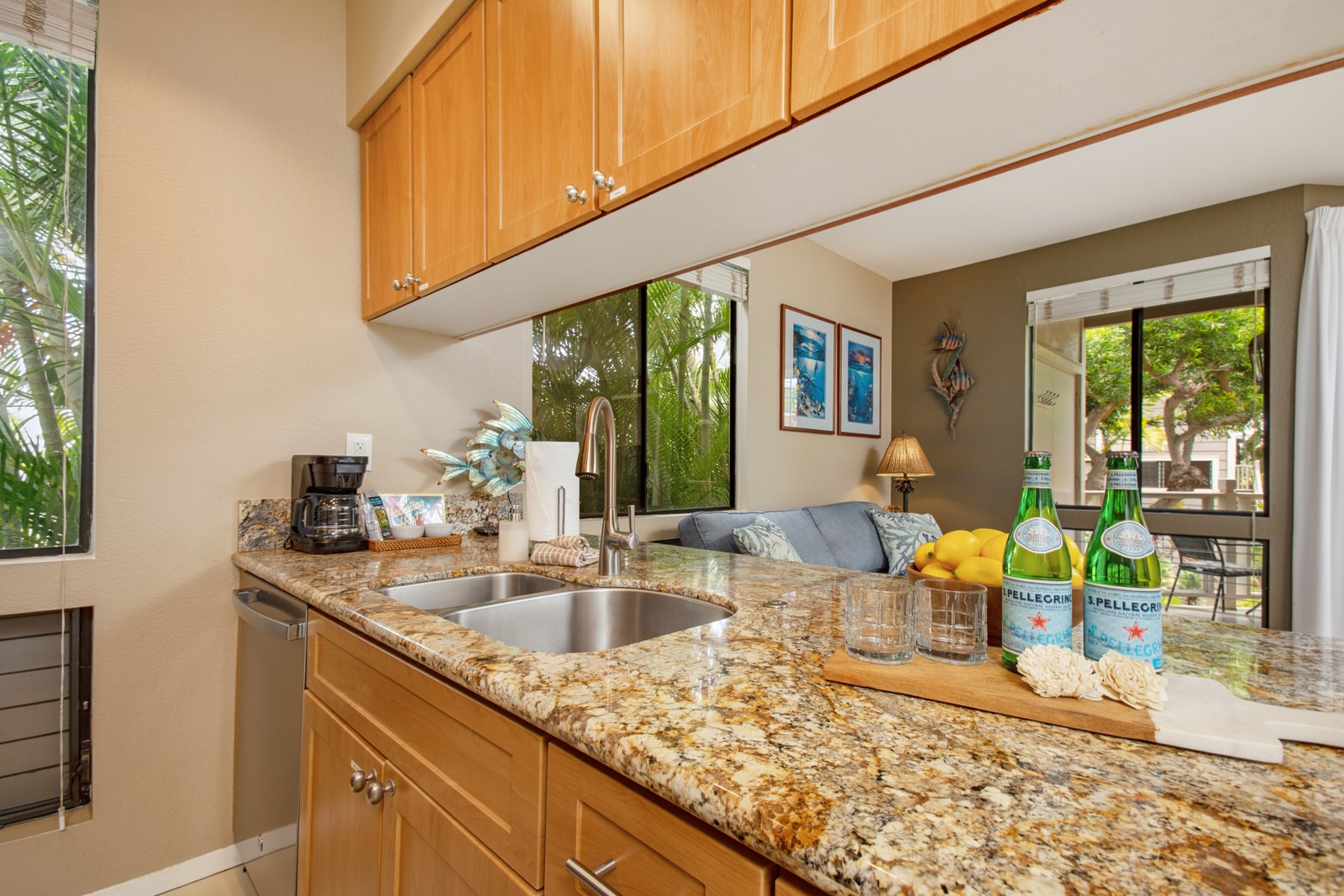 Enjoy a fully equipped kitchen with granite counters and bar seating

