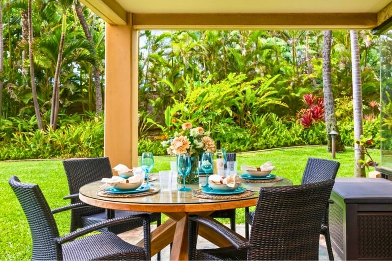 Your morning coffee has never had it so good, served steps from the sand, framed by swaying palms and blooms