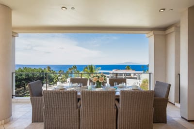 Perched like royalty over paradise, this balcony serves up morning mimosas with a panoramic splash of joy
