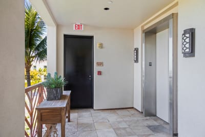 Arrive to a sense of ease—lush details, tranquil tones, and the promise of paradise just through the door
