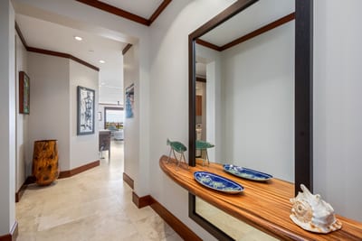 Your getaway begins here, just beyond the elevator—where warm light, natural textures, and calm await inside