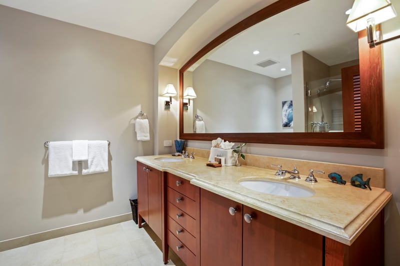 The walk-in shower beckons like a sandy cove—complete with a bench for lounging mid-lather or philosophizing mid-rinse