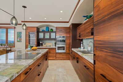 With pendant lights that dangle like whispers above the island, even midnight snacks feel like candlelit affairs
