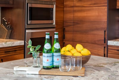 Savor a sparkling welcome in a kitchen where form meets function—and every detail is designed with care