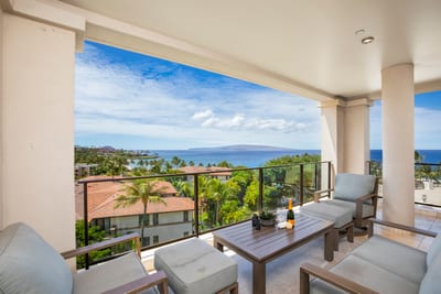 From your balcony throne, the resort hums with life below while breezes and blue skies reign supreme above