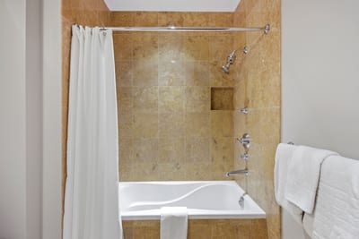 Whether prepping for beach day or bedtime, this charming bath has you covered with towels fluffier than clouds