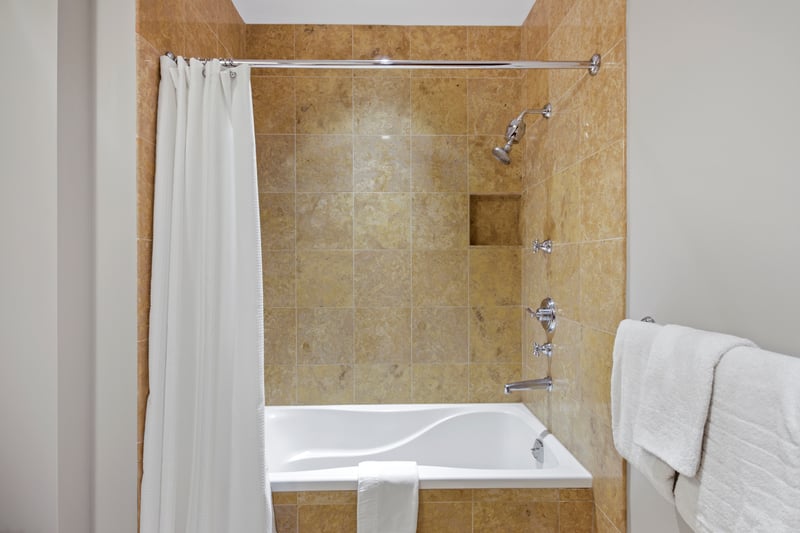 Whether prepping for beach day or bedtime, this charming bath has you covered with towels fluffier than clouds