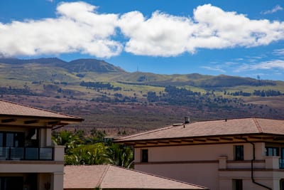 From sea to summit, this view paints a love letter to Maui—soft rooftops below, wild clouds above