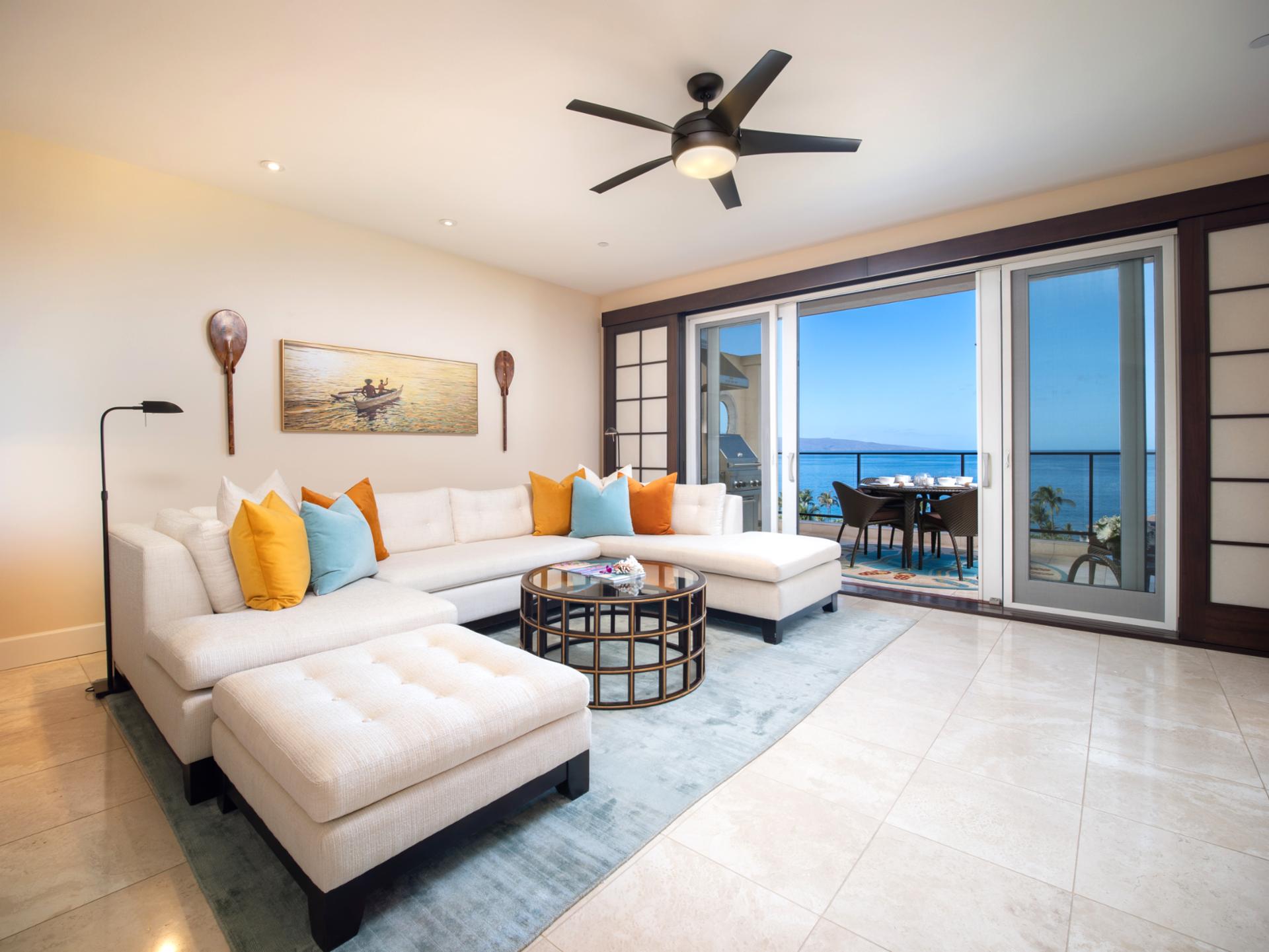 Lounge comfortably in your bright living room with ocean views and ample seating for your group.