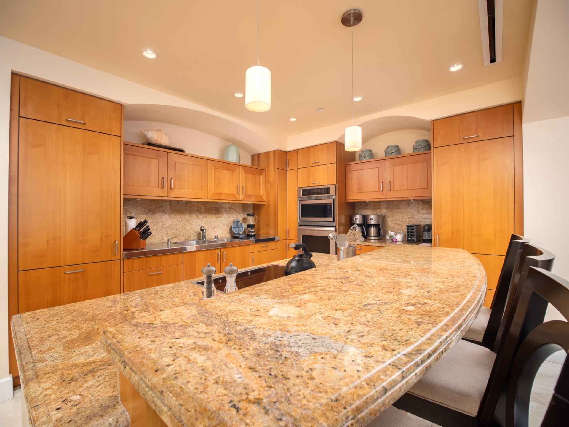 Granite counters and premium appliances make cooking in your gourmet kitchen a pleasure.