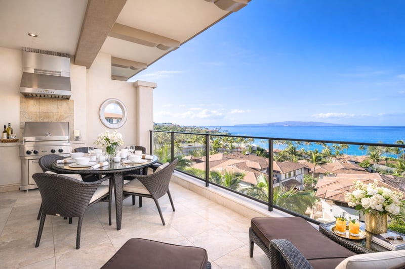 Dine and relax on this expansive lanai with built-in BBQ grill and panoramic ocean views.