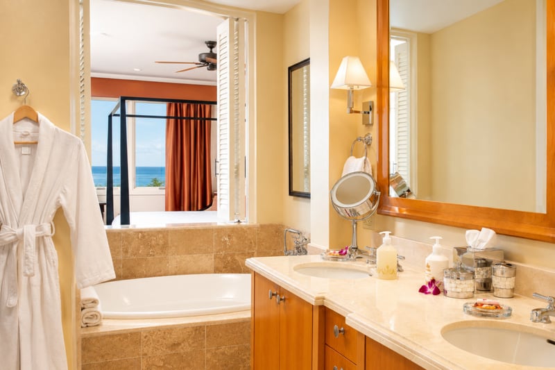 Primary bathroom at Wailea Beach Villas PH505 — soaking tub and dual vanity opening directly to the ocean-view bedroom WBV-PH505