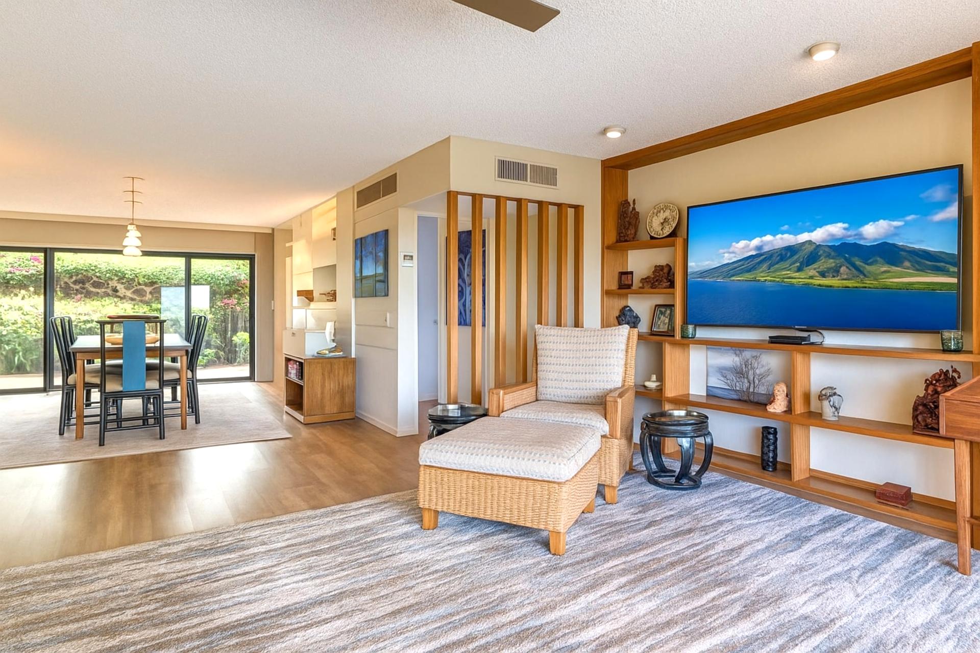 Slide open the glass and let nature in—this living room effortlessly connects indoors to island serenity