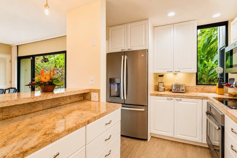 Open kitchen layout ideal for preparing meals and entertaining.