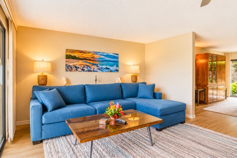 Inviting living room with tropical decor and resort ambiance.
