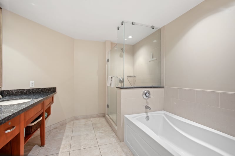 Your bathroom includes a deep soaking tub and shower combination, offering a relaxing place to refresh after time in the Maui sun. HKK-537