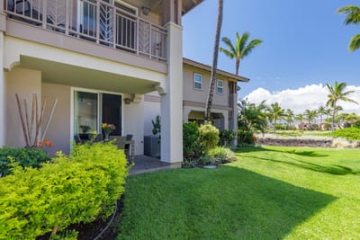 Island living perfected with open space, palm trees, and vibrant greenery