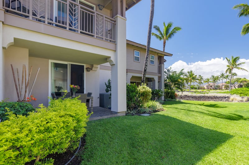Island living perfected with open space, palm trees, and vibrant greenery