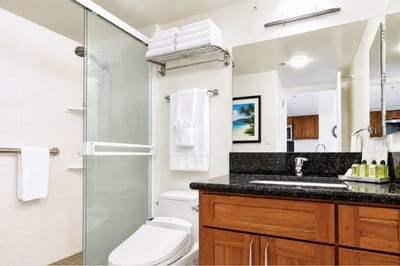 Clean and spacious primary bathroom with walk in shower