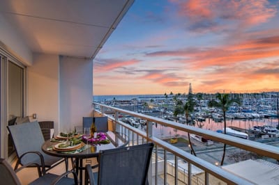 Private lanai overlooking the Ala Wai Yacht Harbor and Pacific Ocean.