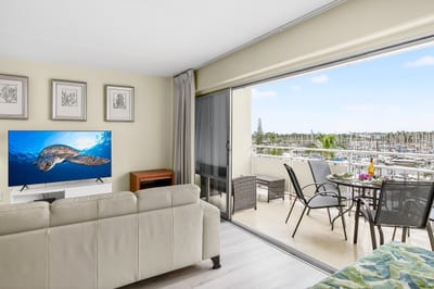 Open-concept layout seamlessly connecting the living area and private lanai.