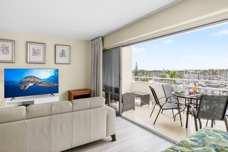 Open-concept layout seamlessly connecting the living area and private lanai. ILK-437