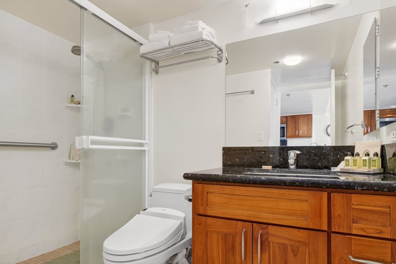 Clean and spacious bathroom designed for comfort and convenience. ILK-437