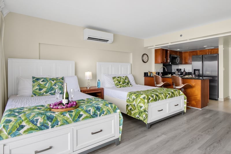 The comfortable double beds are the perfect place to rest after a day exploring Honolulu ILK-437