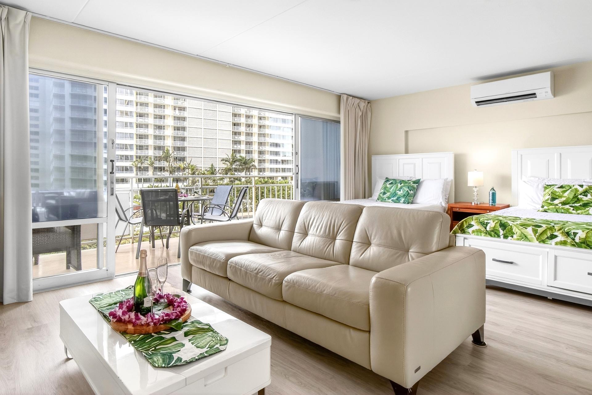 The comfortable seating area is the perfect place to unwind after a day exploring Honolulu