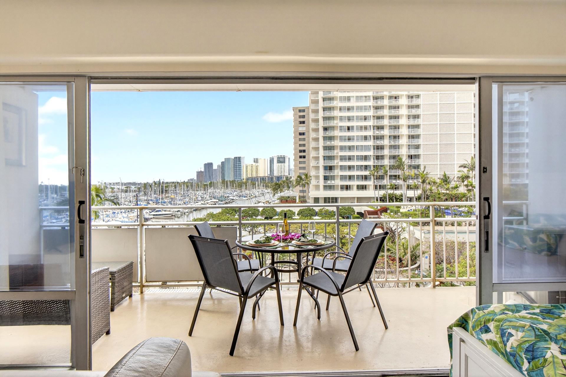 Lanai seating steps from the harbor