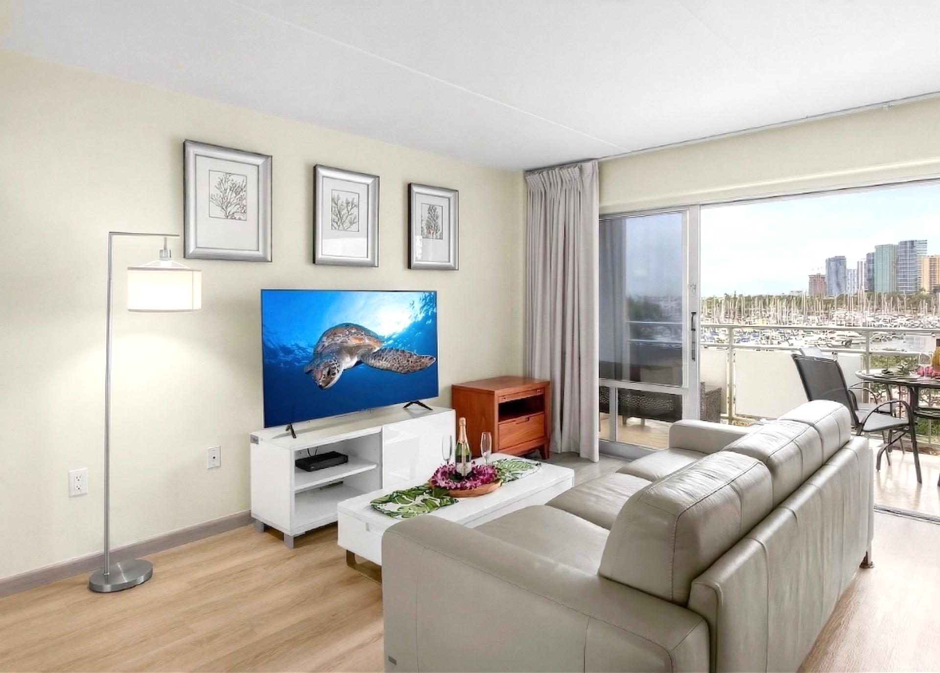 Open living area with harbor-facing sliding glass doors