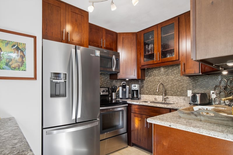 Modern kitchen with stainless steel appliances and generous counter space