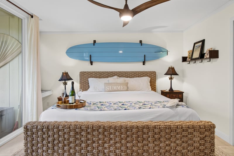 The comfortable bedroom features a king size bed and luxury hotel linens