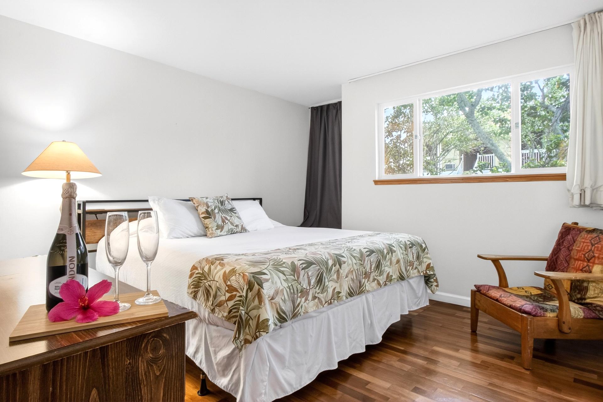 Wake up refreshed in the bright and comfortable primary bedroom