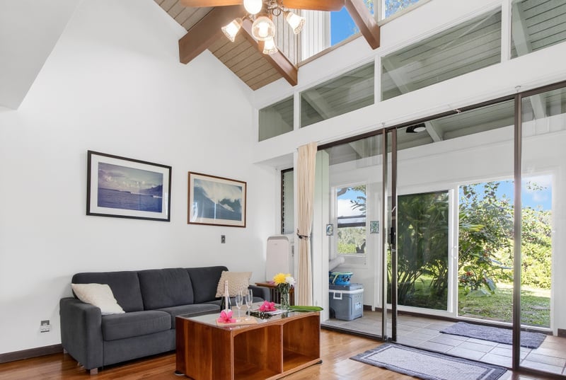 Open concept living with sliding doors to fresh air